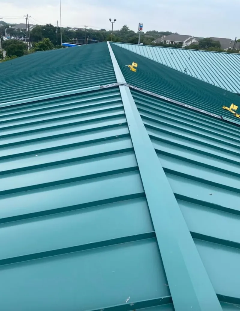 Green commercial metal roof ridge and valley for Metal Roof Repair in Westwego
