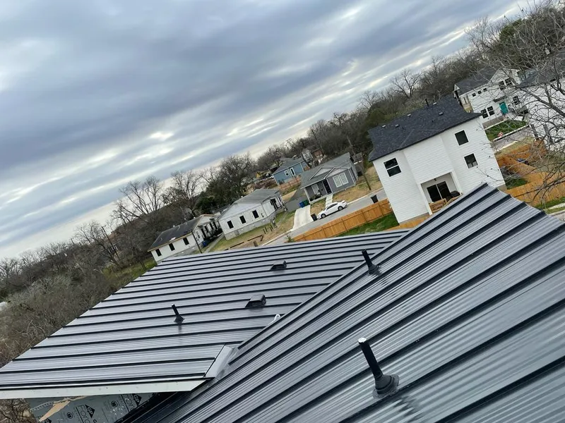 Standing seam metal roof panels with vents for Skylight Repair in Westwego